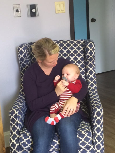 Whitney Sherman at work with son Jack
